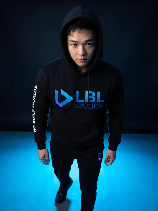 Justin Won in a black LBL Studios hoodie with a blue floor wash
